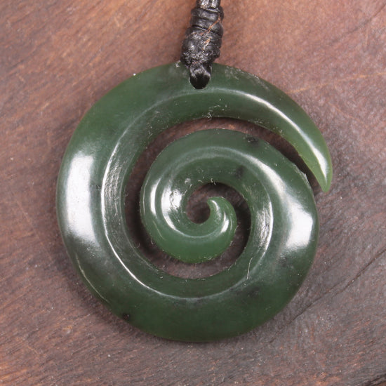 Koru pendant carved from Kawakawa Pounamu - NZ Greenstone