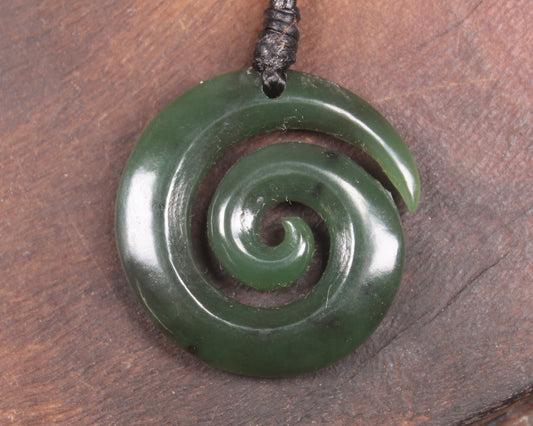 Koru pendant carved from Kawakawa Pounamu - NZ Greenstone