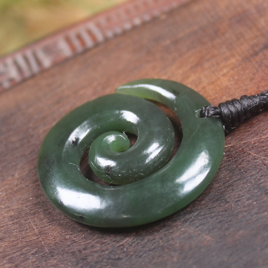 Koru pendant carved from Kawakawa Pounamu - NZ Greenstone
