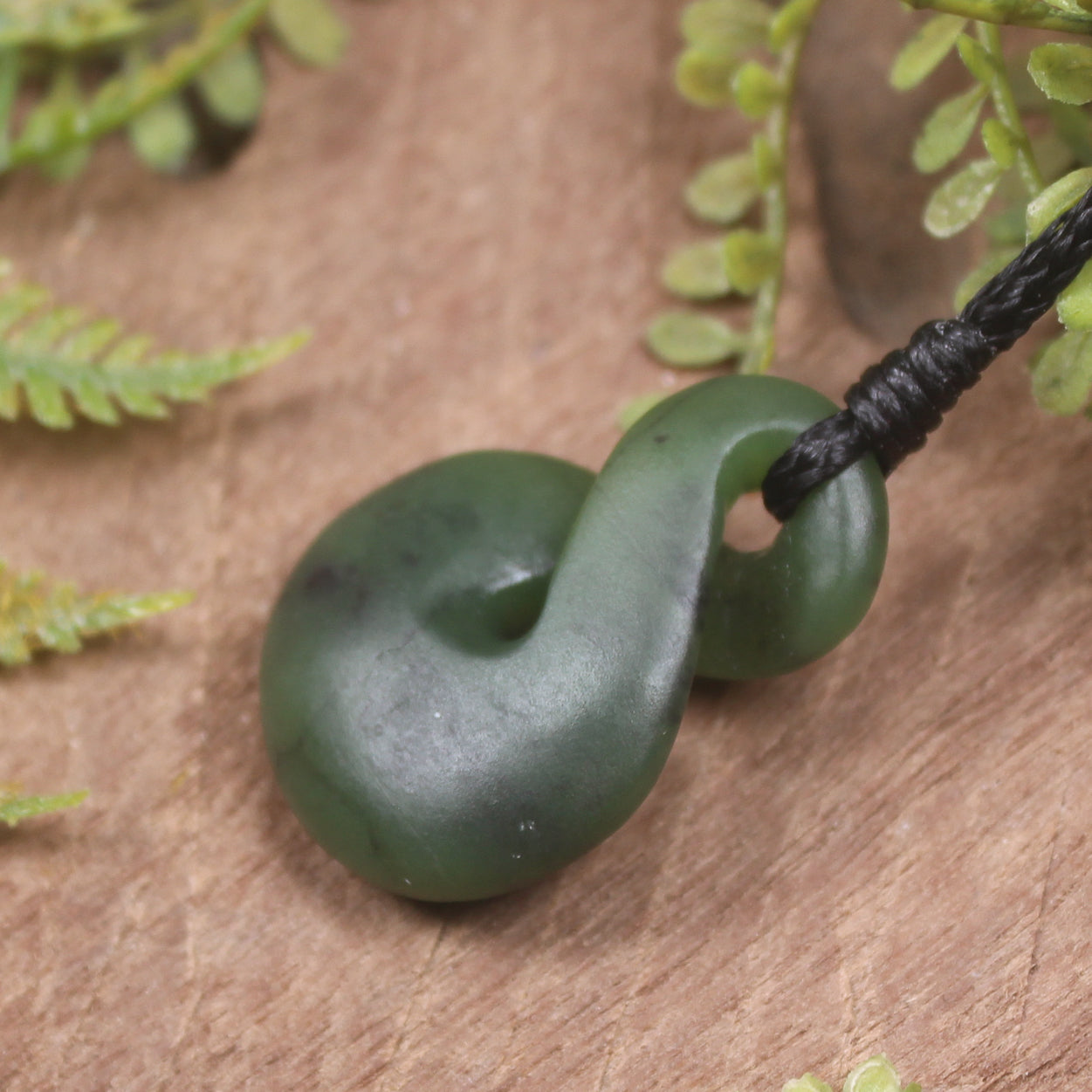 Twist or Pikorua carved from Hapopo Pounamu - NZ Greenstone