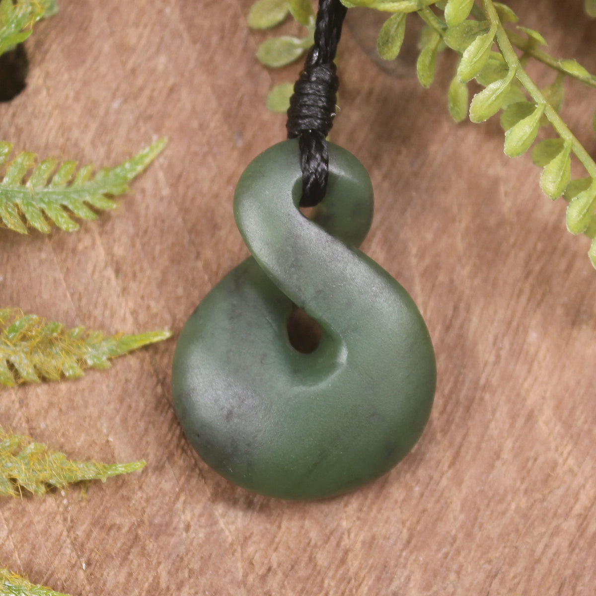 Twist or Pikorua carved from Hapopo Pounamu - NZ Greenstone