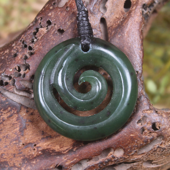 Koru pendant carved from Kawakawa Pounamu - NZ Greenstone