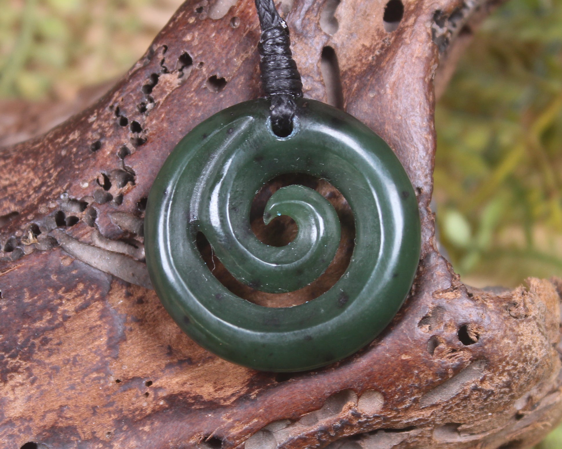Koru pendant carved from Kawakawa Pounamu - NZ Greenstone