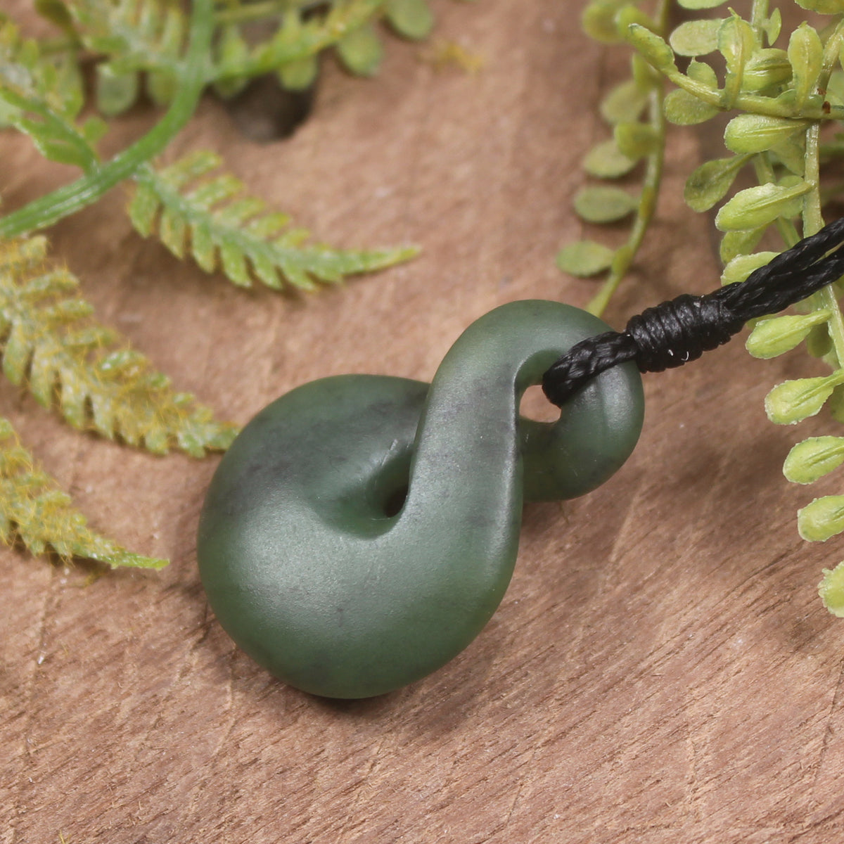 Twist or Pikorua carved from Hapopo Pounamu - NZ Greenstone