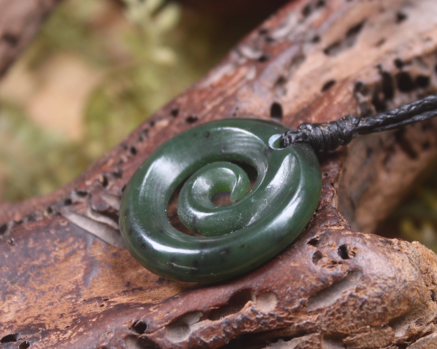 Koru pendant carved from Kawakawa Pounamu - NZ Greenstone
