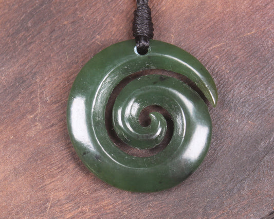 Koru pendant carved from Kawakawa Pounamu - NZ Greenstone