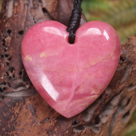 Heart carved from Rhodonite 