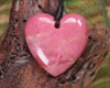 Heart carved from Rhodonite 