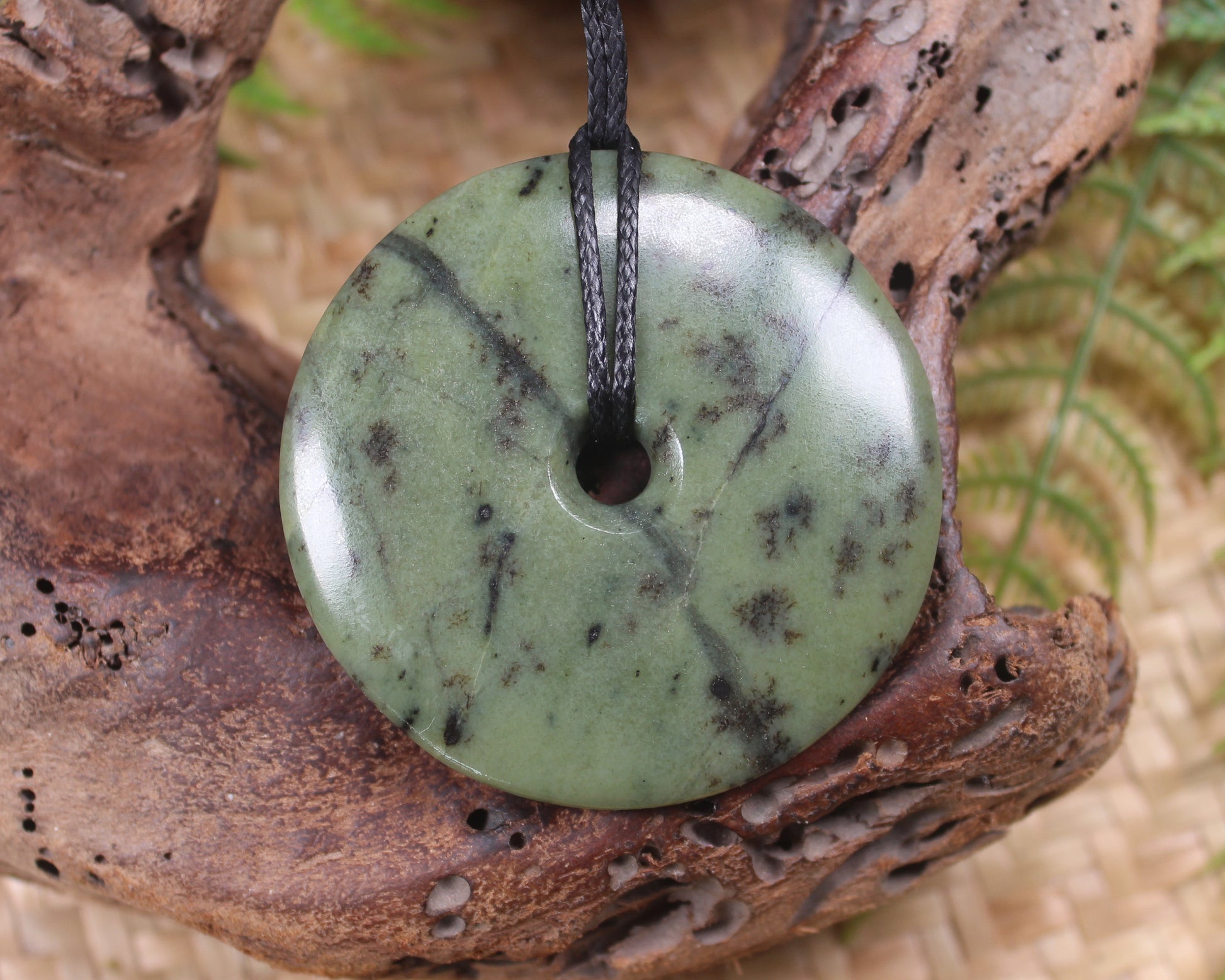 Porowhita carved from Rimu Pounamu - NZ Greenstone