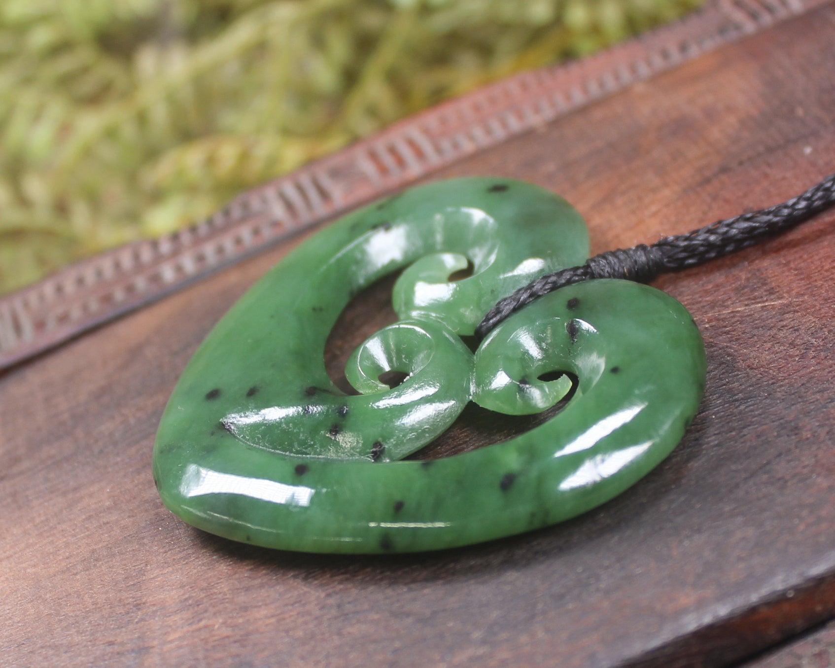 Koru Heart pendant carved from Hapopo Pounamu - NZ Greenstone