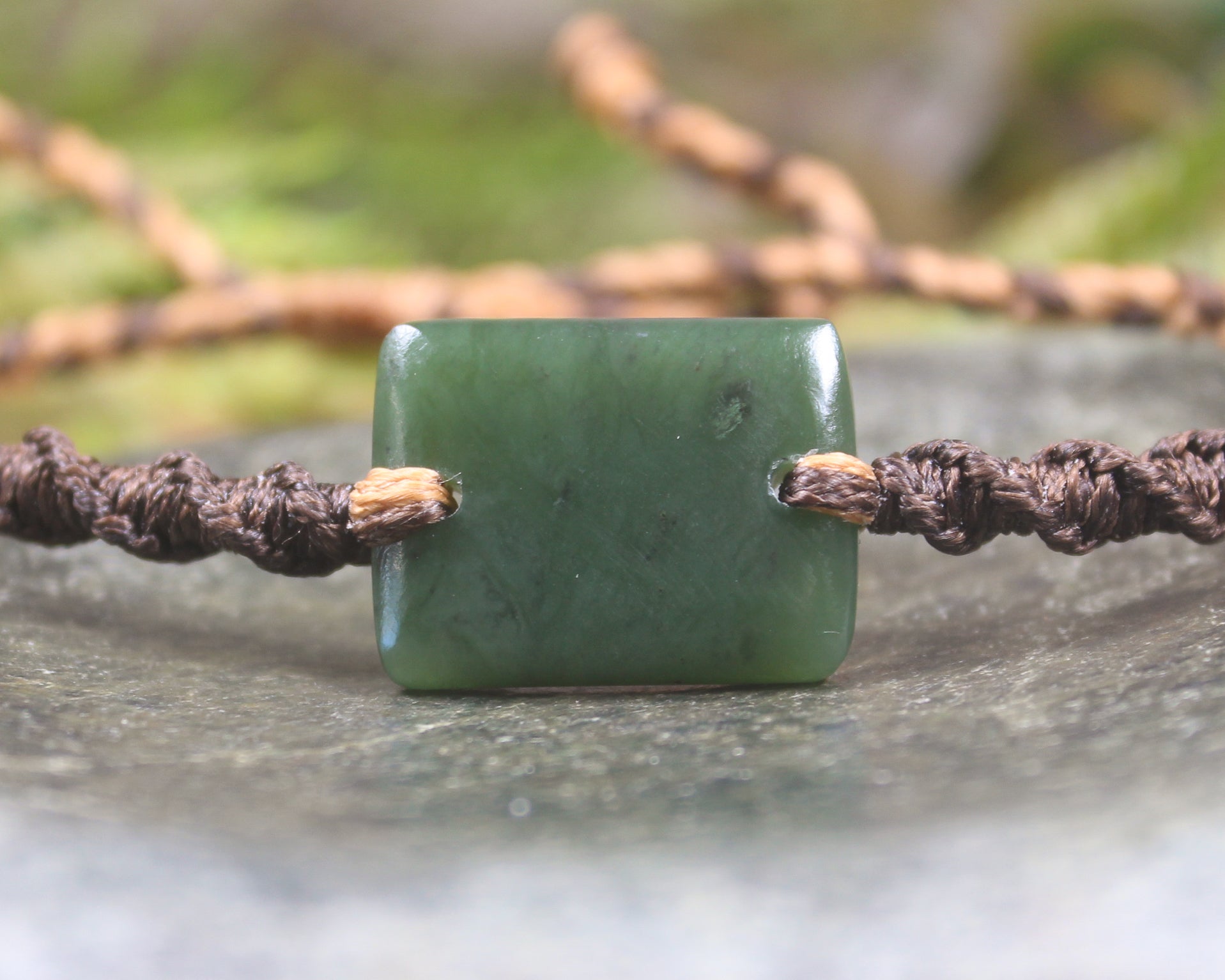 Adjustable cord bracelet with Hapopo Pounamu