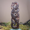 Manaia sculpture carved from recycled wood