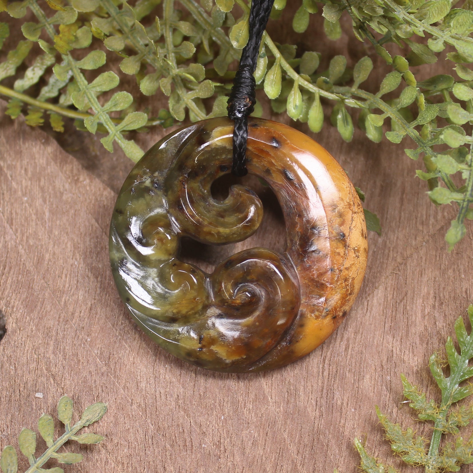Koru carved from Totoweka Pounamu - NZ Greenstone