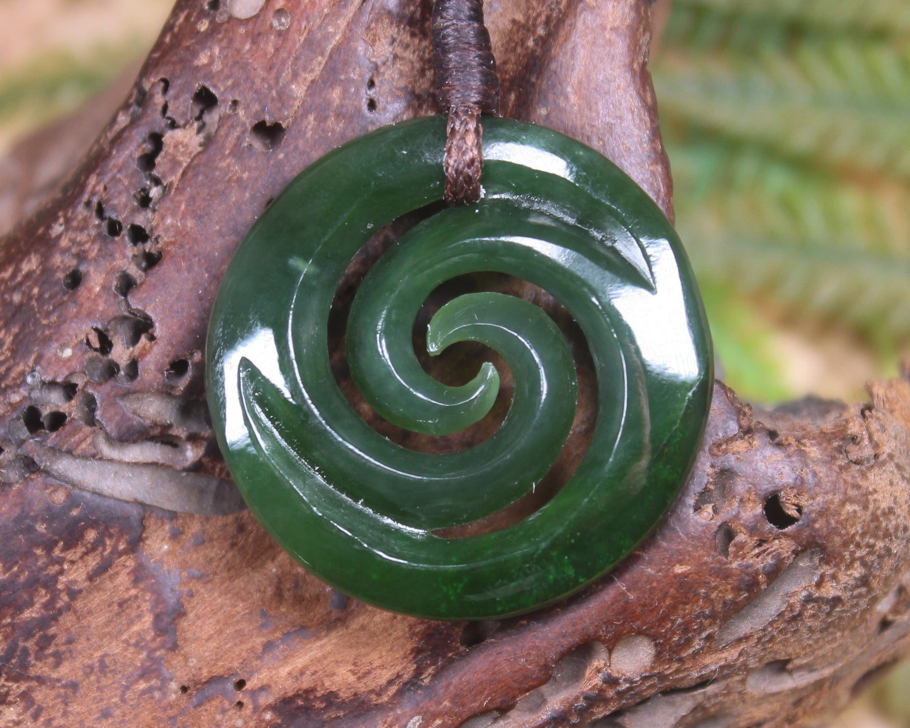 Koru pendant carved from Kawakawa Pounamu - NZ Greenstone