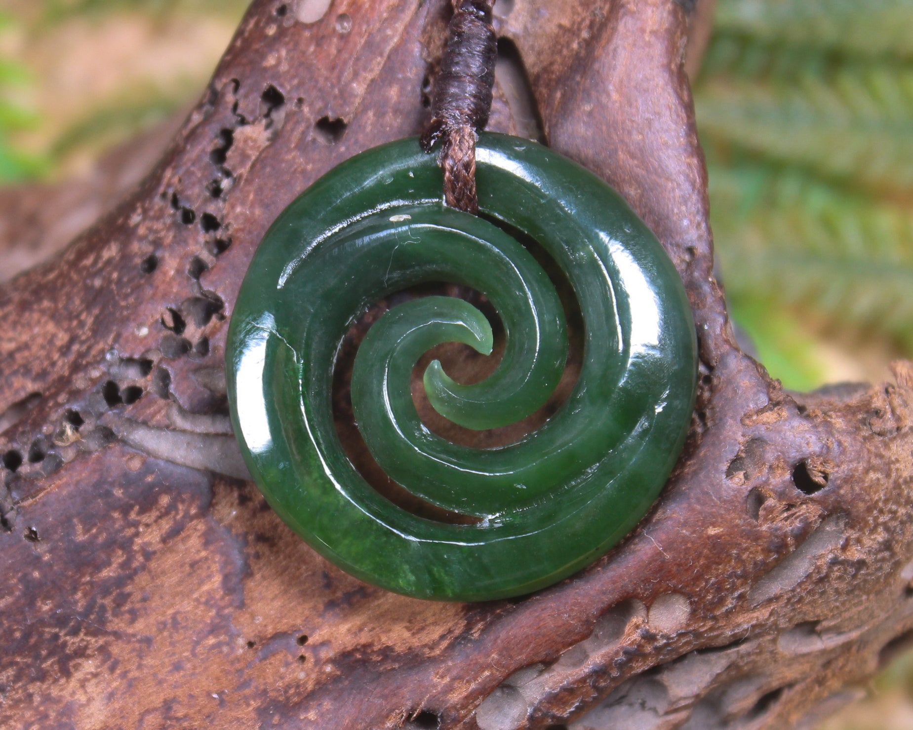 Koru pendant carved from Kawakawa Pounamu - NZ Greenstone