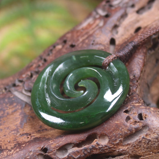 Koru pendant carved from Kawakawa Pounamu - NZ Greenstone