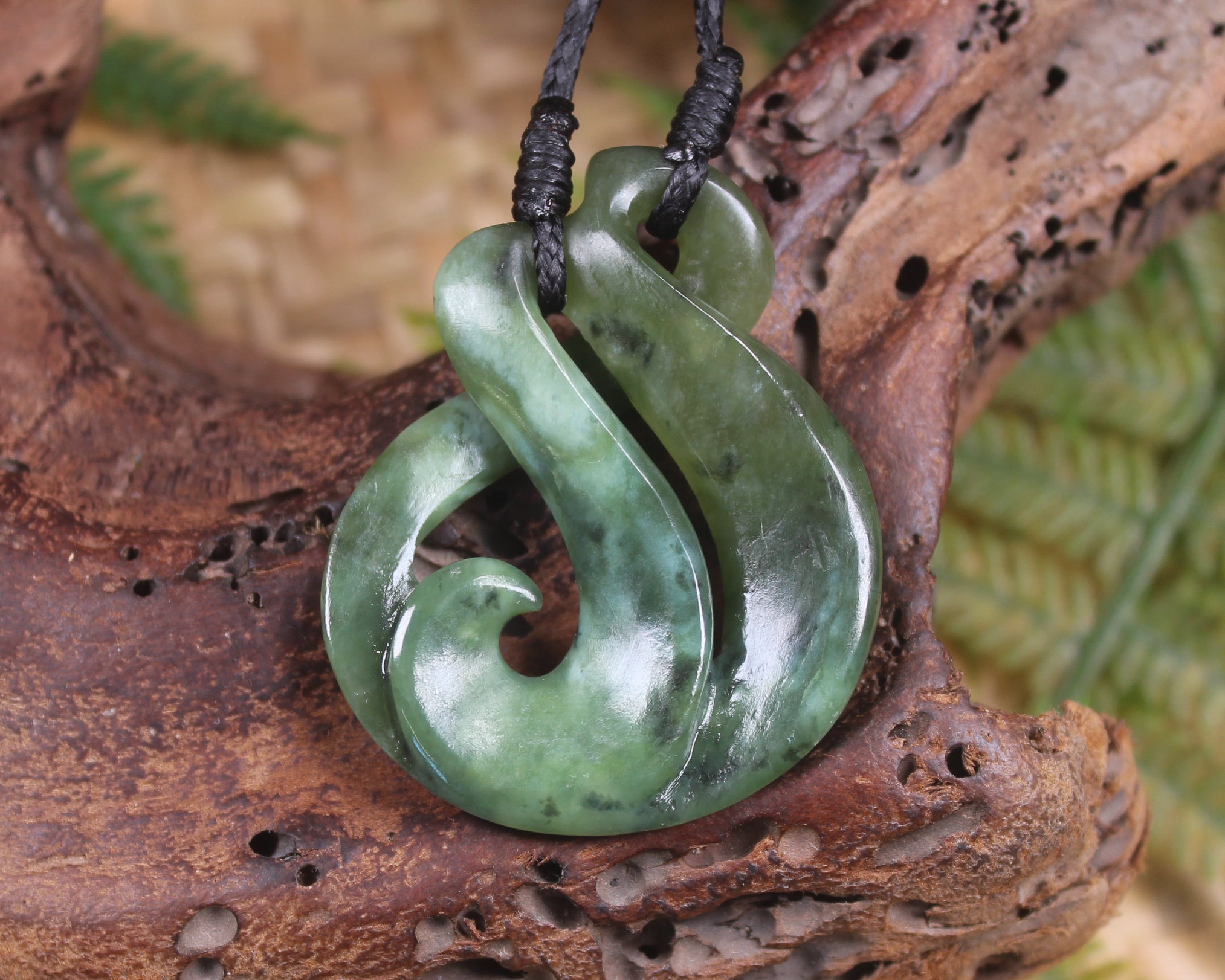 Koru Twist Pendant carved from Rimu Pounamu - NZ Greenstone