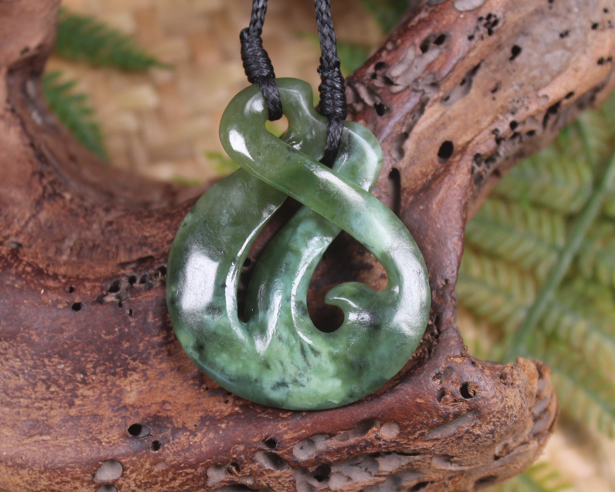 Koru Twist Pendant carved from Rimu Pounamu - NZ Greenstone