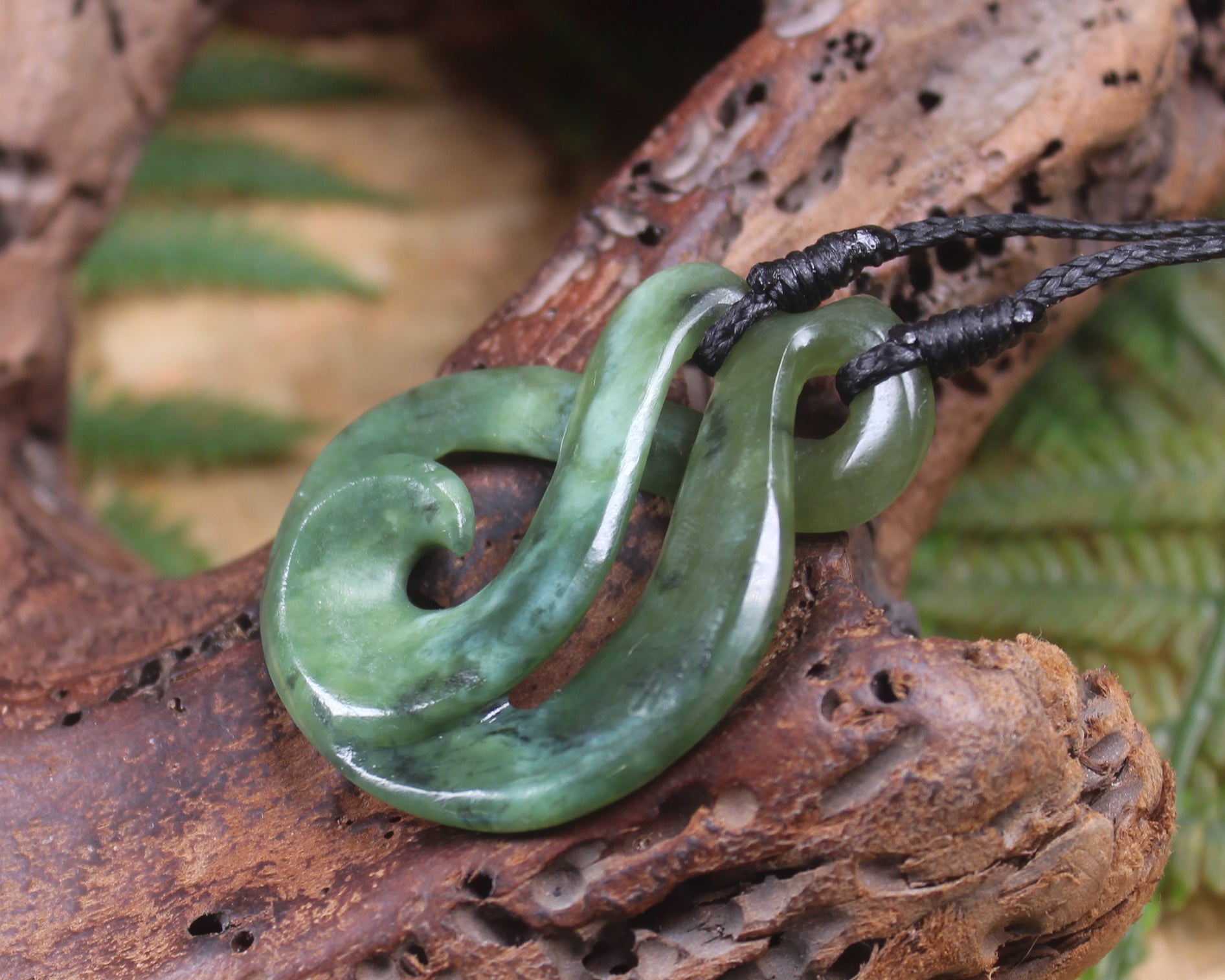 Koru Twist Pendant carved from Rimu Pounamu - NZ Greenstone