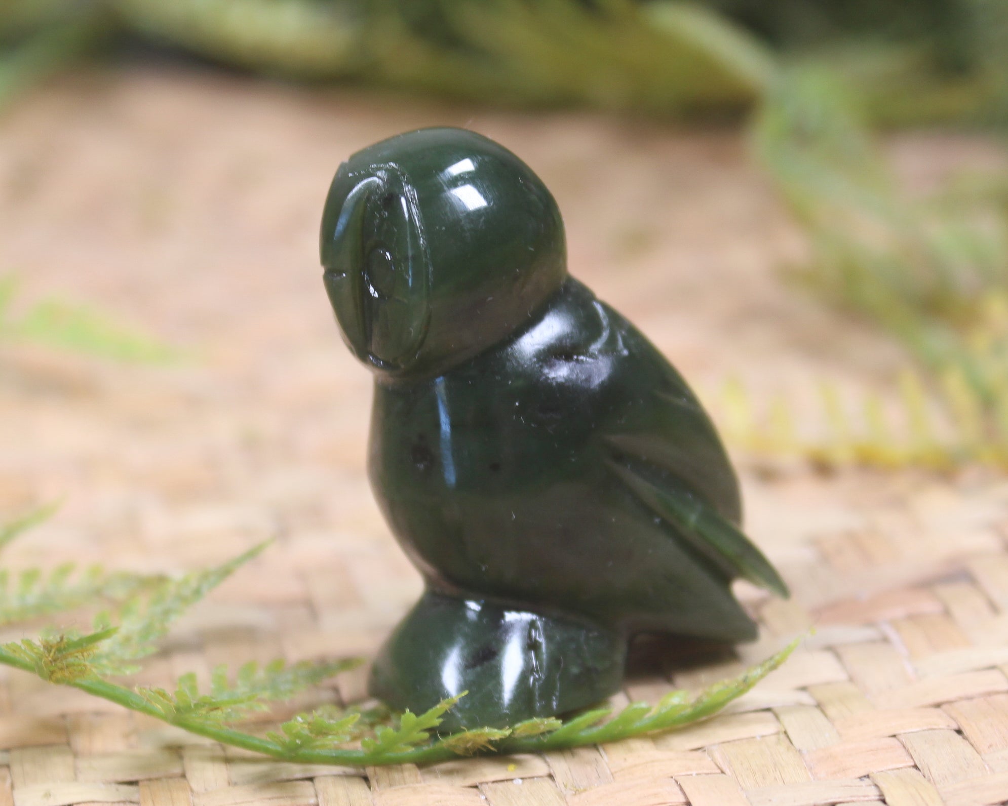 Pounamu owl sculpture