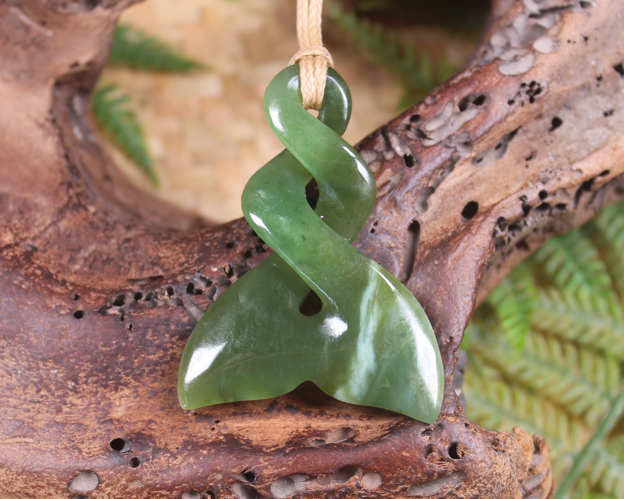 Whale tail carved from Hapopo Pounamu - NZ Greenstone