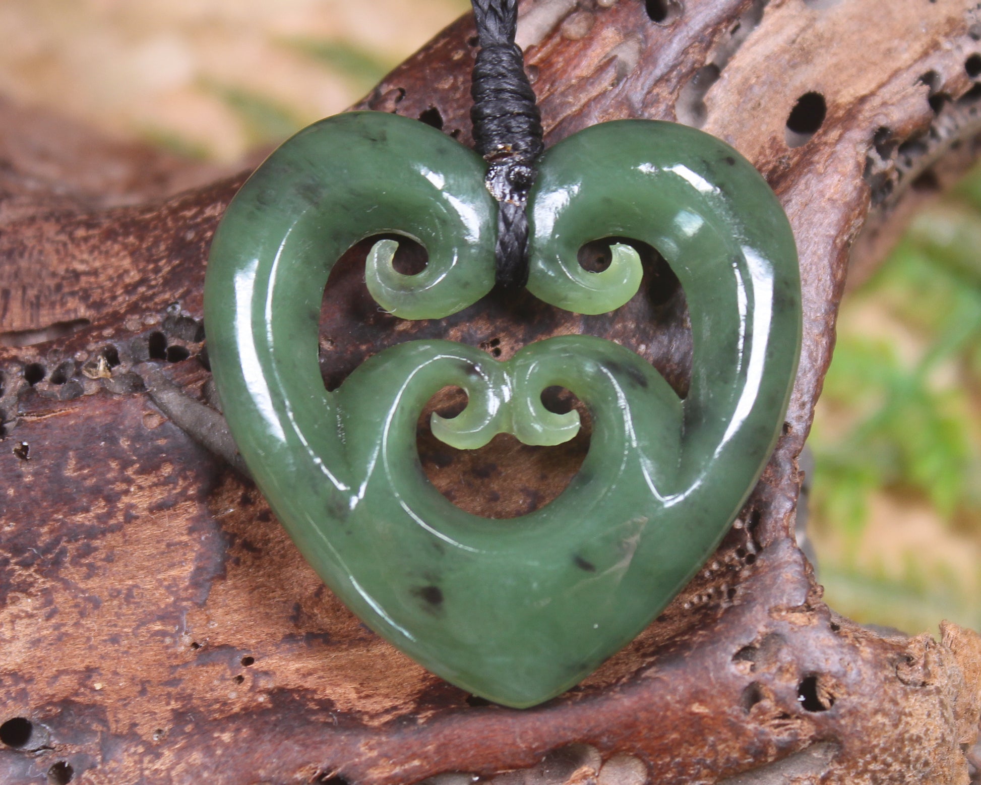 Koru Heart pendant carved from Hapopo Pounamu - NZ Greenstone