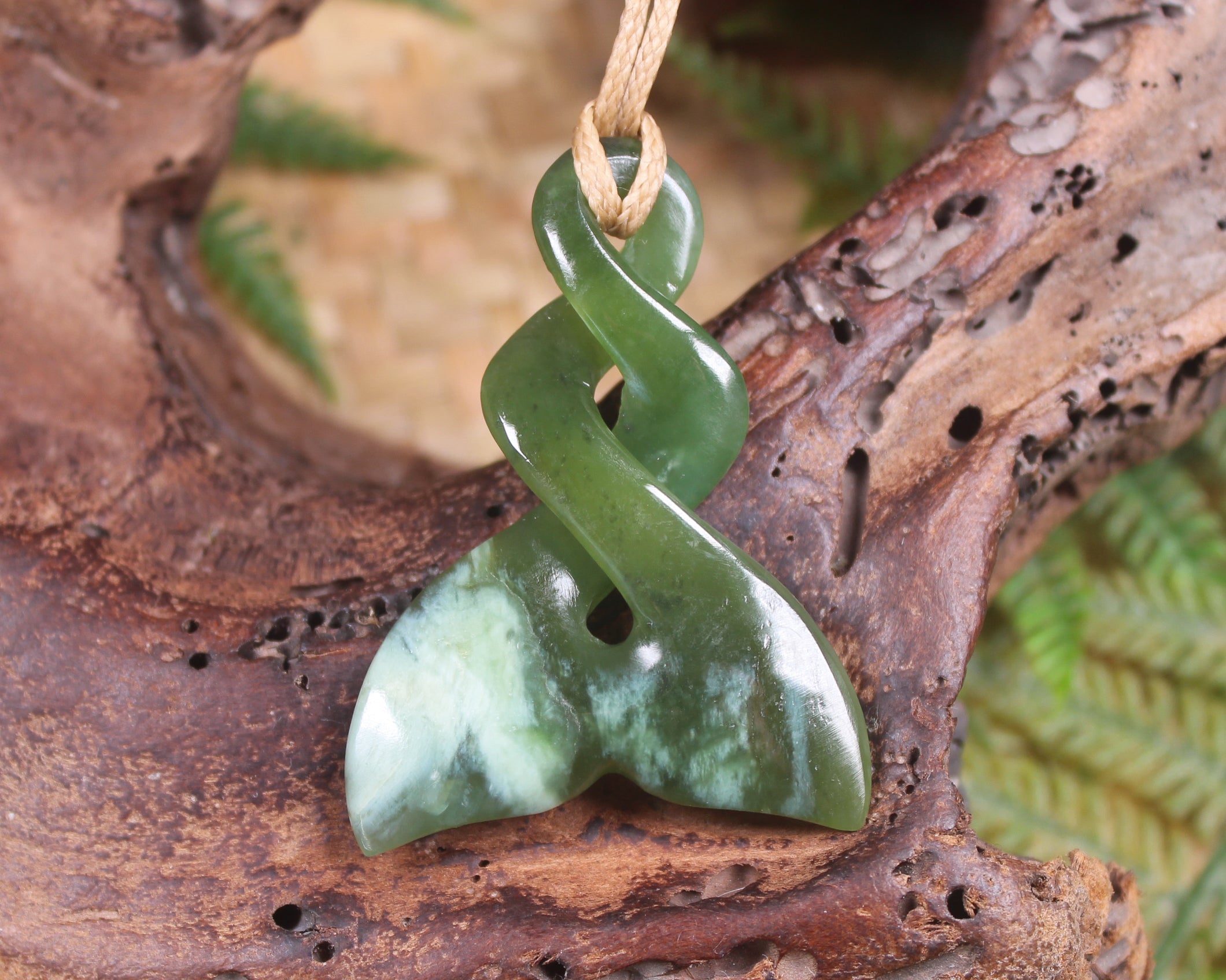 Whale tail carved from Hapopo Pounamu - NZ Greenstone