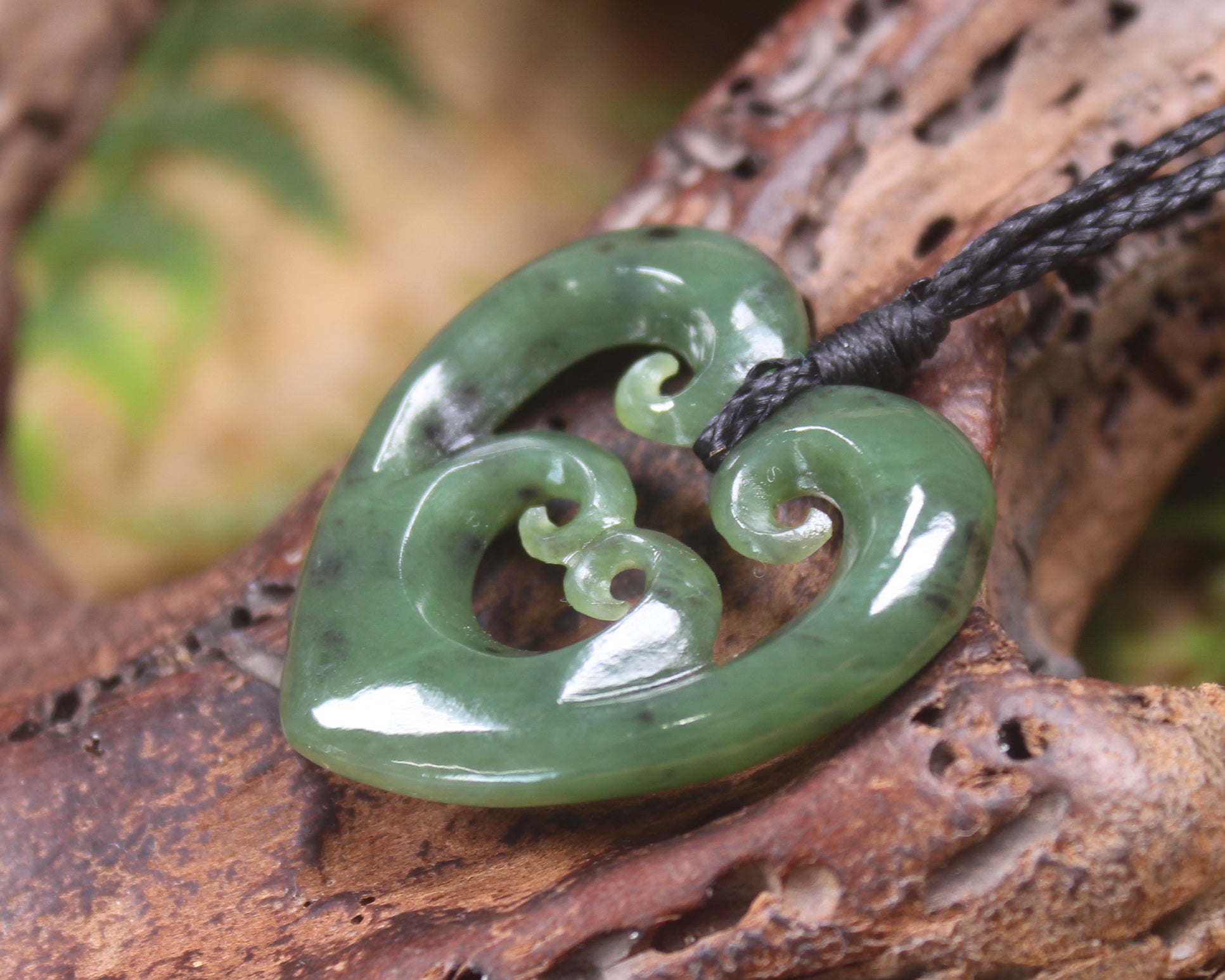 Koru Heart pendant carved from Hapopo Pounamu - NZ Greenstone