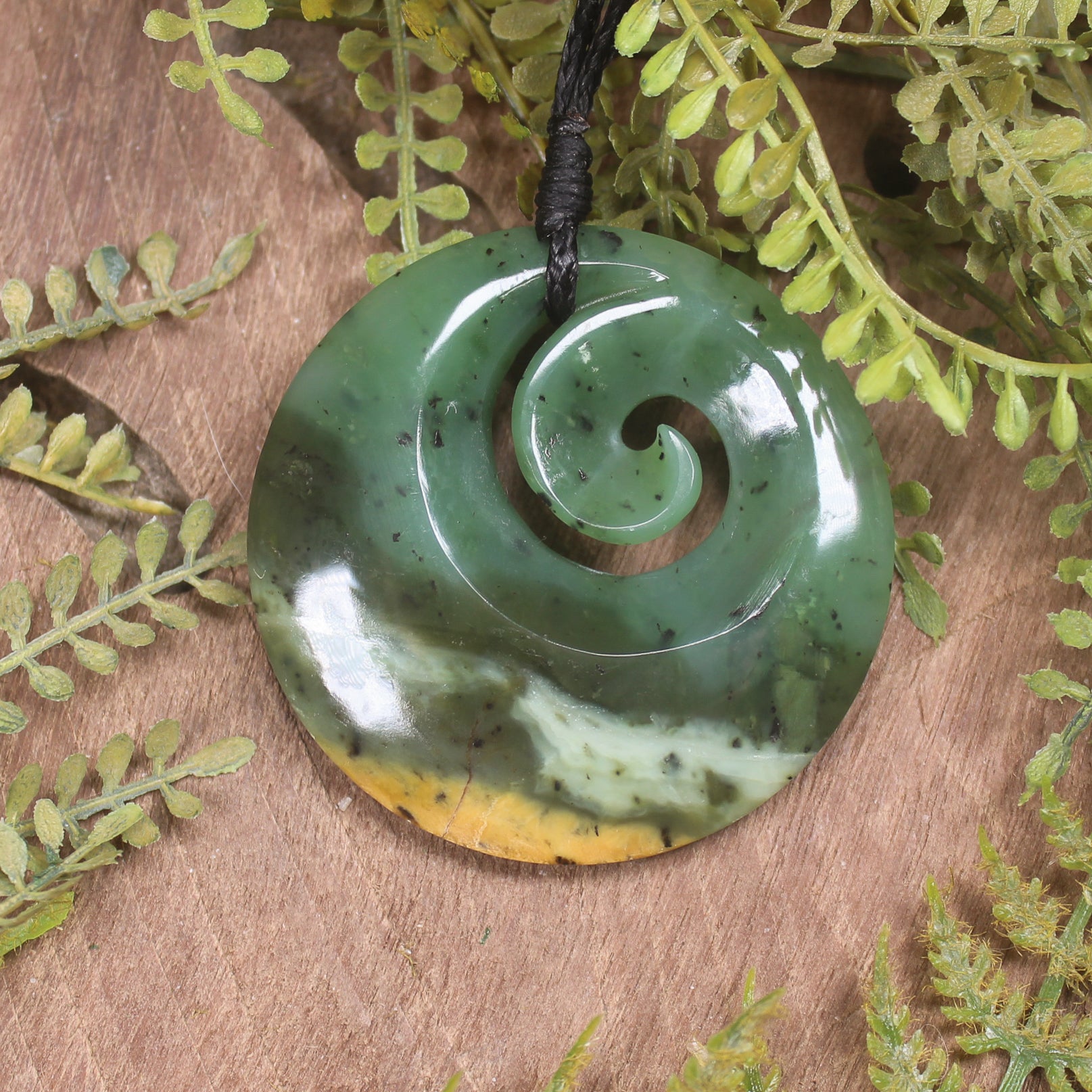 Koru carved from Raukaraka Pounamu - NZ Greenstone