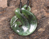 Koru Twist Pendant carved from Rimu Pounamu - NZ Greenstone