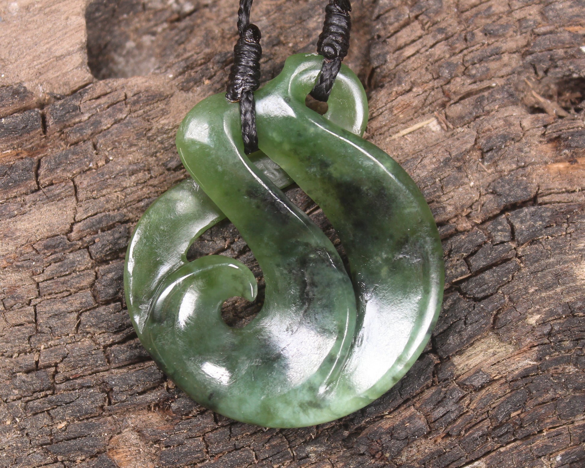 Koru Twist Pendant carved from Rimu Pounamu - NZ Greenstone