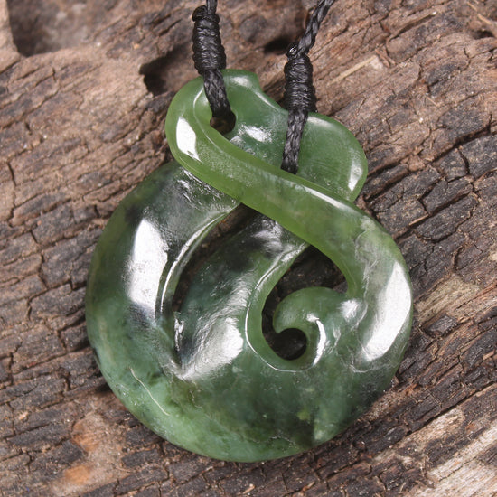 Koru Twist Pendant carved from Rimu Pounamu - NZ Greenstone