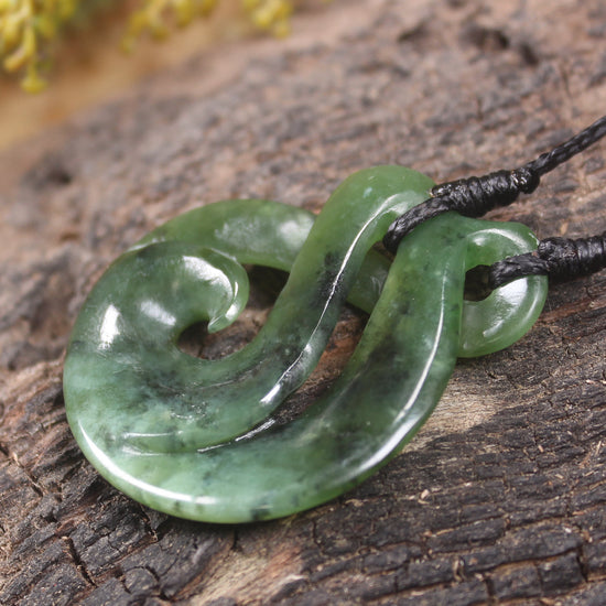 Koru Twist Pendant carved from Rimu Pounamu - NZ Greenstone