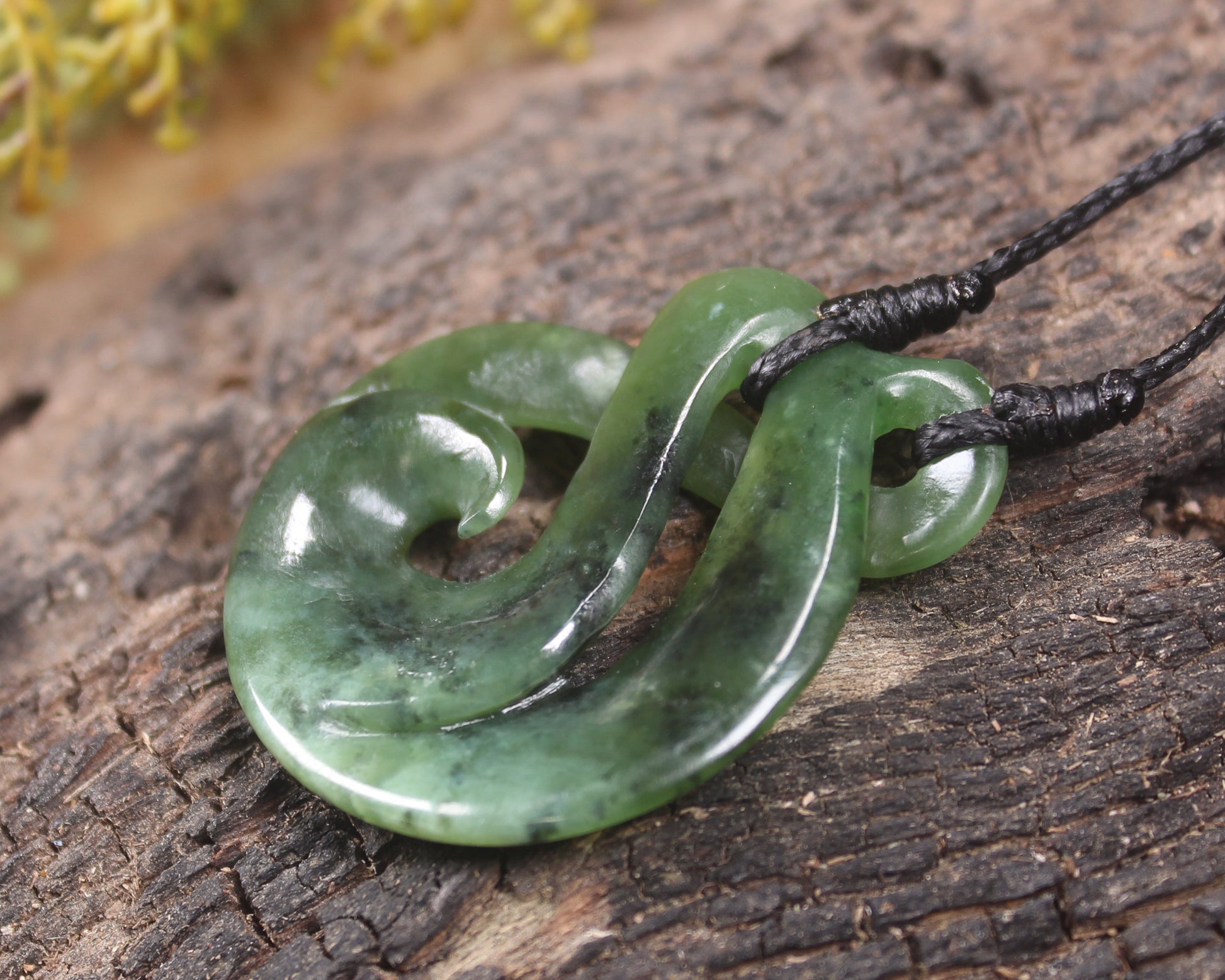 Koru Twist Pendant carved from Rimu Pounamu - NZ Greenstone
