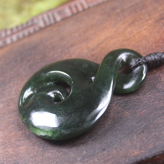 Koru Twist carved from Kawakawa Pounamu - NZ Greenstone
