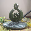 Rimu Pounamu Koru Twist set on a Pounamu base - NZ Greenstone