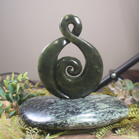 Rimu Pounamu Koru Twist set on a Pounamu base - NZ Greenstone