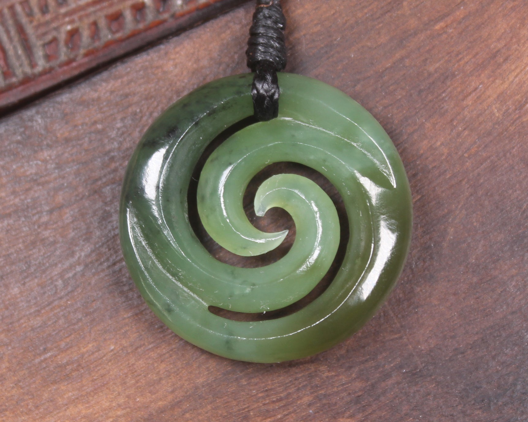 Koru carved from Hapopo Pounamu - NZ Greenstone