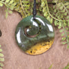 Koru carved from Flower Jade Pounamu - NZ Greenstone