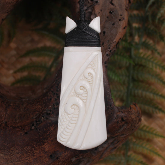 Toki or Adze with Koru carved from Beef Bone