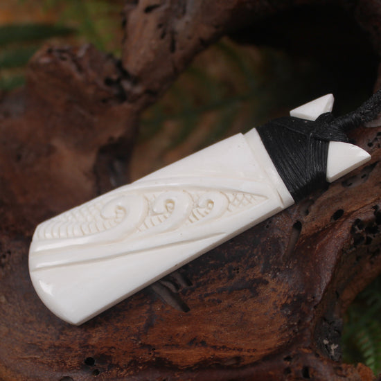 Toki or Adze with Koru carved from Beef Bone