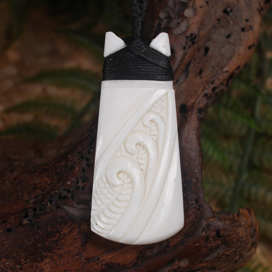Toki or Adze with Koru carved from Beef Bone