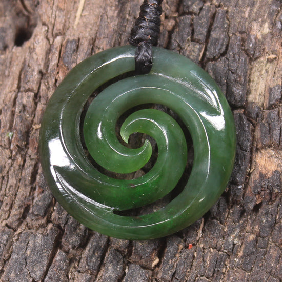 Koru pendant carved from Kawakawa Pounamu - NZ Greenstone