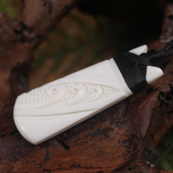 Toki or Adze with Koru carved from Beef Bone