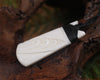 Toki or Adze with Koru carved from Beef Bone