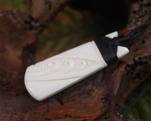 Toki or Adze with Koru carved from Beef Bone