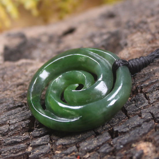 Koru pendant carved from Kawakawa Pounamu - NZ Greenstone