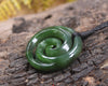 Koru pendant carved from Kawakawa Pounamu - NZ Greenstone