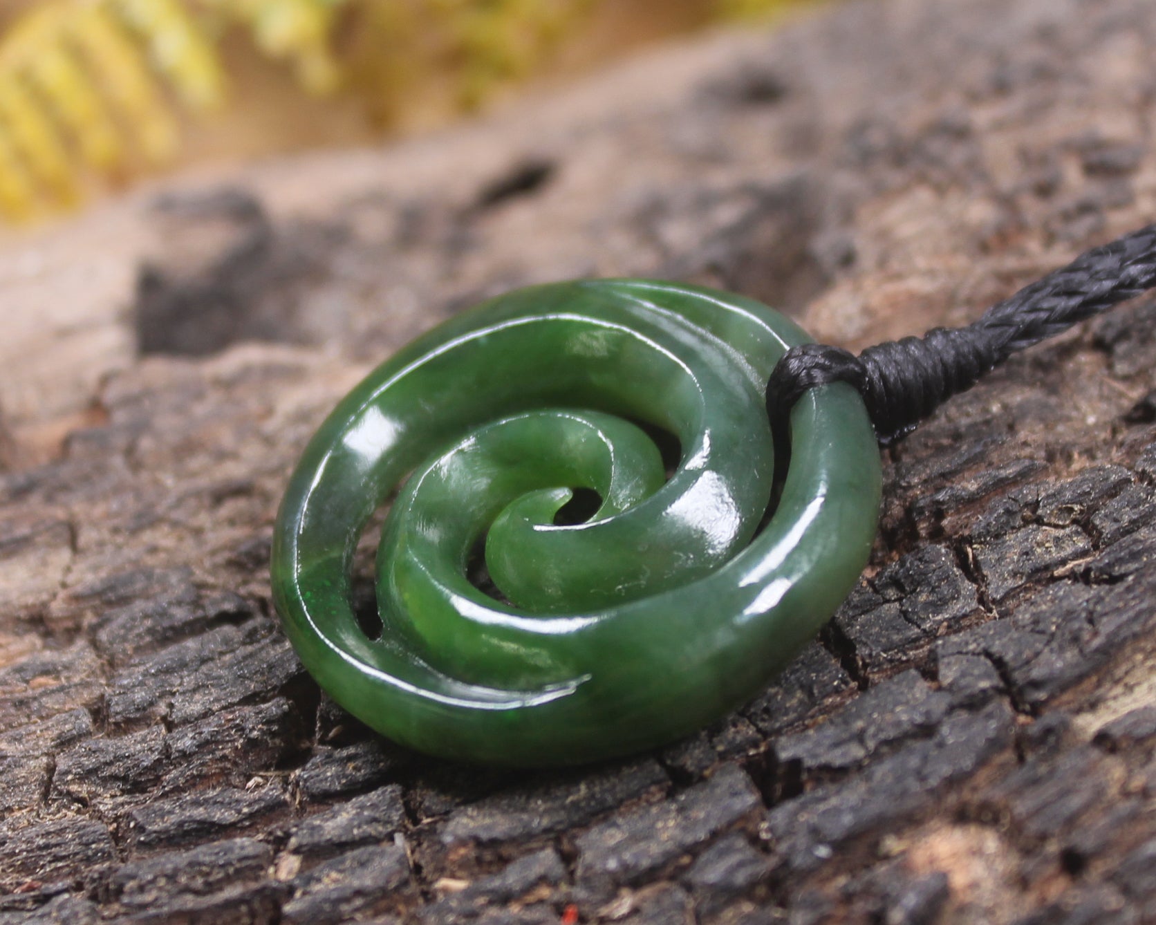 Koru pendant carved from Kawakawa Pounamu - NZ Greenstone