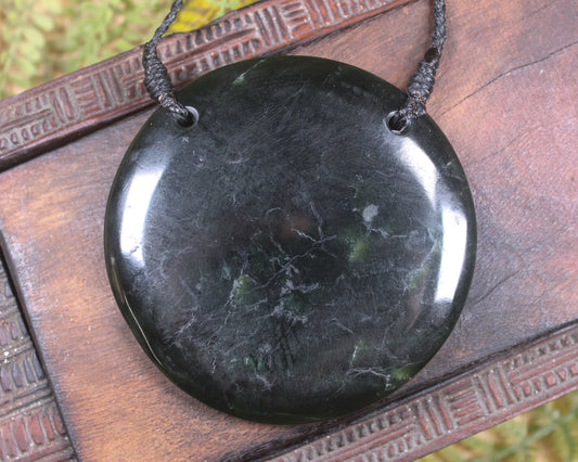 Porowhita or Pi Stone carved from Kawakawa Pounamu - NZ Greenstone